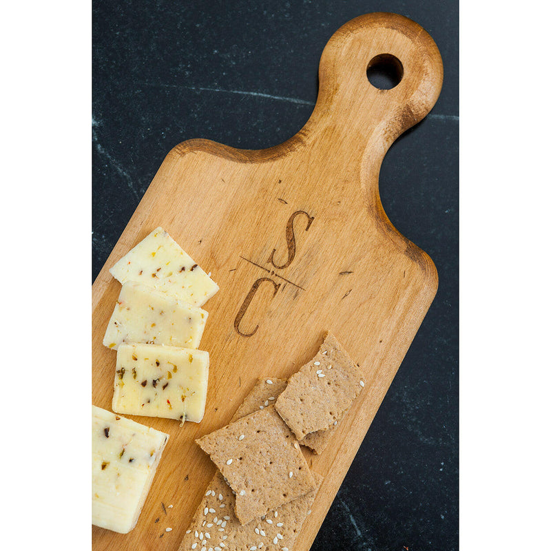 J.K. Adams Maple Artisan Plank Serving Board, featuring an engraved, vintage finish, ideal for serving bread and cheeses with rustic charm and durability.