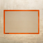 Silpat Nonstick Baking Mats with Sil-Band, featuring reinforced fiberglass mesh for effortless baking. Available in various sizes to suit different baking needs.