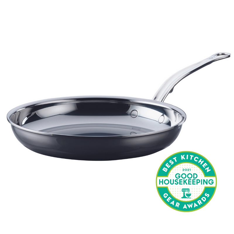Hestan NanoBond Cookware - 5qt Essential Pan + Lid, featuring a stainless-steel skillet with ergonomic handle and award badge, ideal for durable, high-performance cooking.