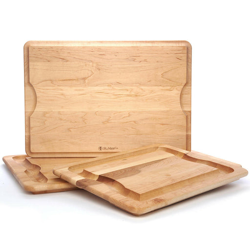 J.K. Adams Maple BBQ Carving Board - Large, 24x16, features undercut handles, flat surface, and edge groove for juices, ideal for grilling or serving roasts.