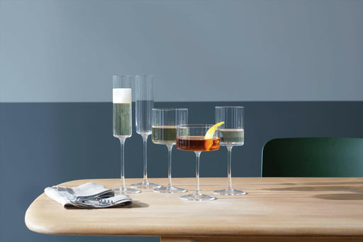 LSA International Otis Glassware Collection Champagne Flute, showcasing a contemporary geometric design with a hand-crafted stem and fire-polished rim for an elegant drinking experience.