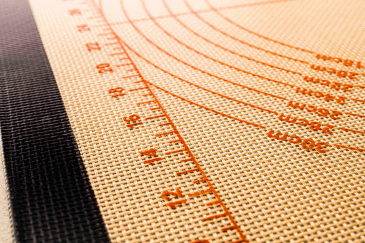 Silpat Perfect Pastry - Jumbo: Non-stick silicone mat with dimensions and rulers for precise dough preparation, ideal for versatile baking solutions and easy cleanup.