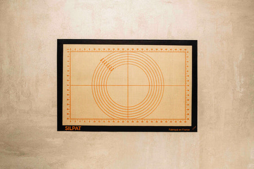 Silpat Perfect Pastry - Large, a non-stick silicone mat with measurement guides, ideal for precise dough preparation and easy cleanup, available at Athens Cooks.