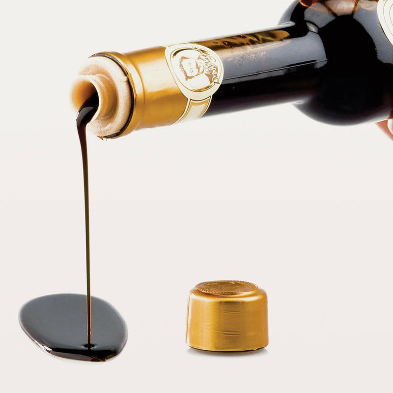 Reale | Balsamic Riserva 16 Year in Boxed Gift Set: Close-up of the bottle showcasing authentic, 100% natural balsamic vinegar crafted from cooked grape must by Leonardi family.