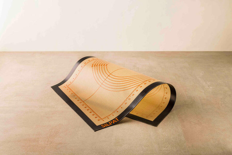 Silpat Perfect Pastry - Jumbo mat, a non-stick, silicone-coated baking surface with measurement guides, ideal for rolling out dough to precise recipe sizes.