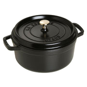 Staub Round Cocotte 9 qt in Lilac, a versatile cast iron pot ideal for slow-cooking, with a self-basting lid, perfect for kitchen-to-table presentations.