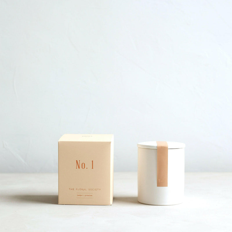 The Floral Society | Soy Wax Candle - No. 1 | Juniper + Geranium in a reusable ceramic vessel, ideal for creating an inviting atmosphere in living spaces.