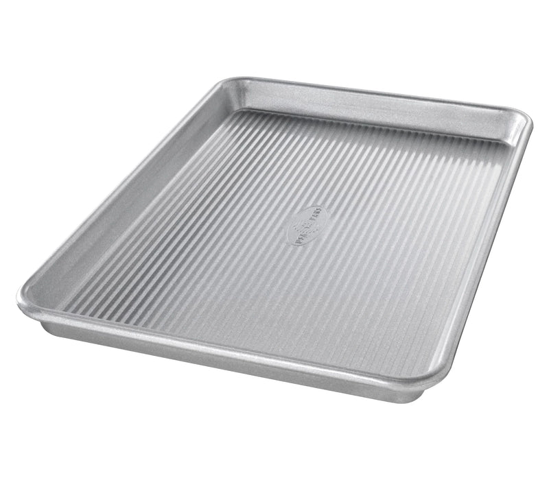 USA Pan | Sheet Pans - Half Sheet Pan, ideal for toaster ovens, features a fluted design and nonstick coating, perfect for baking cookies and roasting vegetables.