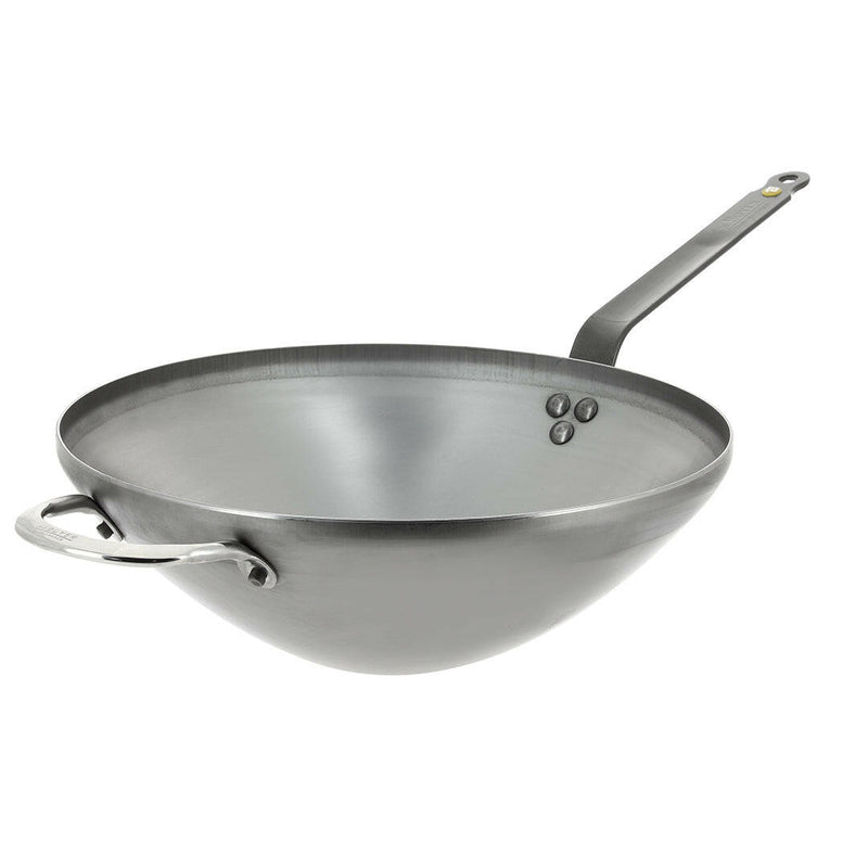 de Buyer | Mineral B Carbon Steel Wok - 12.5 shown, highlighting its sturdy carbon steel construction ideal for versatile cooking methods like stir-frying and deep-frying.