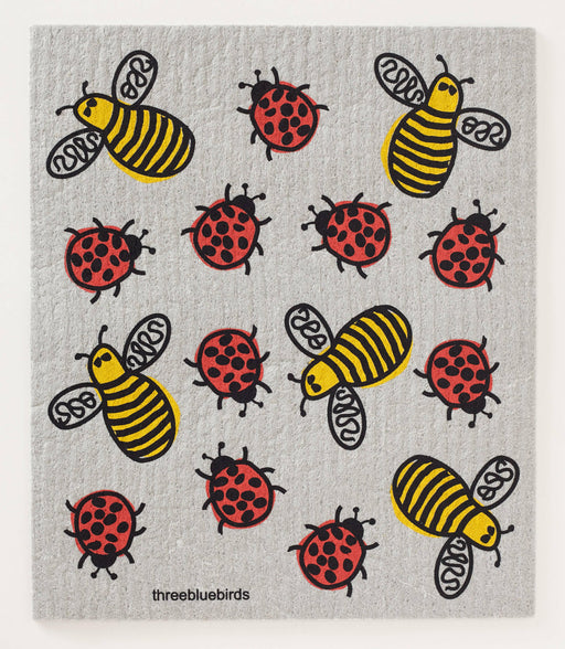 Three Bluebirds Swedish Dishcloth with whimsical ladybug and bee drawings, showcasing a sustainable, durable, biodegradable design. Ideal for eco-friendly kitchen tasks.