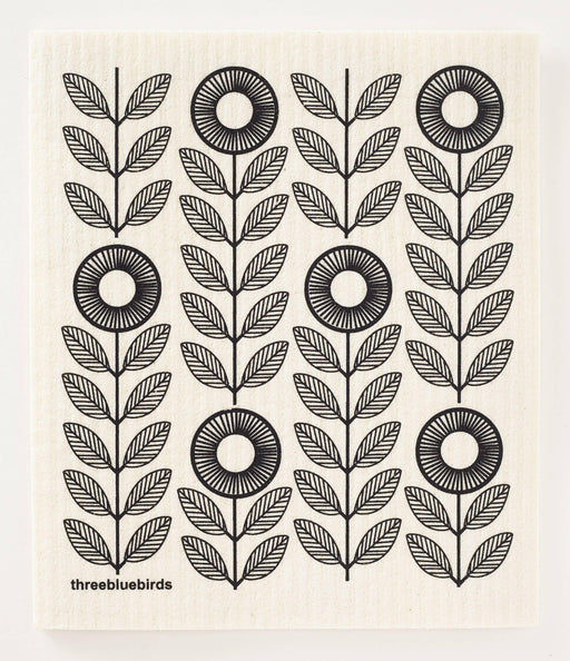 Three Bluebirds Swedish Dishcloths featuring a black and white floral and leaf motif, highlighting sustainable and stylish design for efficient cleaning.