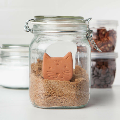 Danica | Terracotta Sugar Savers - Cat: A cat-shaped terracotta piece in a mason jar, designed to keep brown sugar soft and moist.