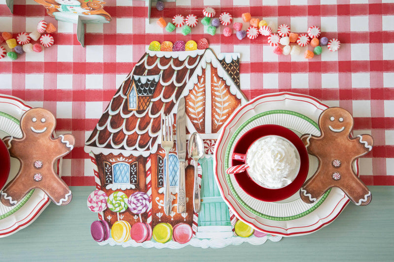 Hester & Cook Gingerbread Cocktail Napkins from the Winter Holiday Collection, featuring whimsical holiday motifs perfect for festive table settings.