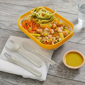 Zoku | Pocket Utensil Sets - Charcoal shown with a knife beside food, emphasizing the compact, portable design ideal for replacing single-use plastics.