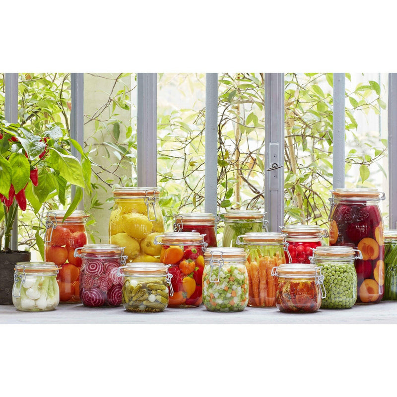 Le Parfait | Rounded French Glass Storage Jars - 3L, showcasing diverse preserved foods on a sunlit tabletop, ideal for stylish and efficient pantry storage.