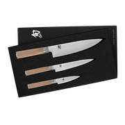 Shun | Classic 3 Pc Starter Set - Blonde: Three premium knives in a foam-lined box, featuring VG-MAX Damascus blades and ergonomic Pakkawood handles, perfect for culinary enthusiasts.