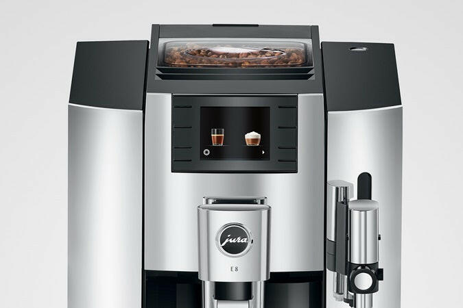 Jura E8 - Fully Automatic Espresso + Coffee Machine in Piano Black, featuring a sleek design, Professional Aroma Grinder, and TFT display, ideal for coffee enthusiasts.