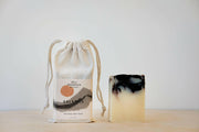 Bell Mountain | Bar Soaps - Solstice shown with a white bag and soap bar, embodying natural, vegan, eco-friendly skincare crafted from plant-based oils and butters.