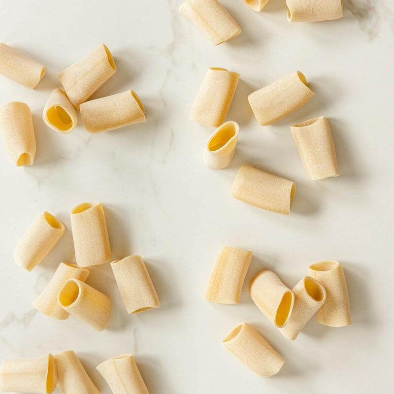 Close-up of Bona Furtuna Ancient Grain Pasta, highlighting its artisanal texture and craftsmanship, embodying Sicilian heritage with 100% organic heirloom wheat.